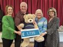 Law firm raises thousands for charities